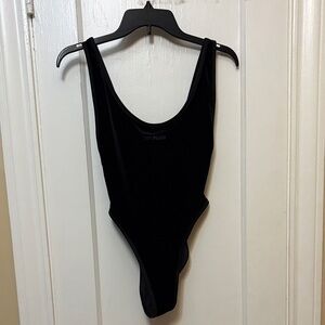 IVY PARK Black High-Cut Scoop One-Piece Bodysuit